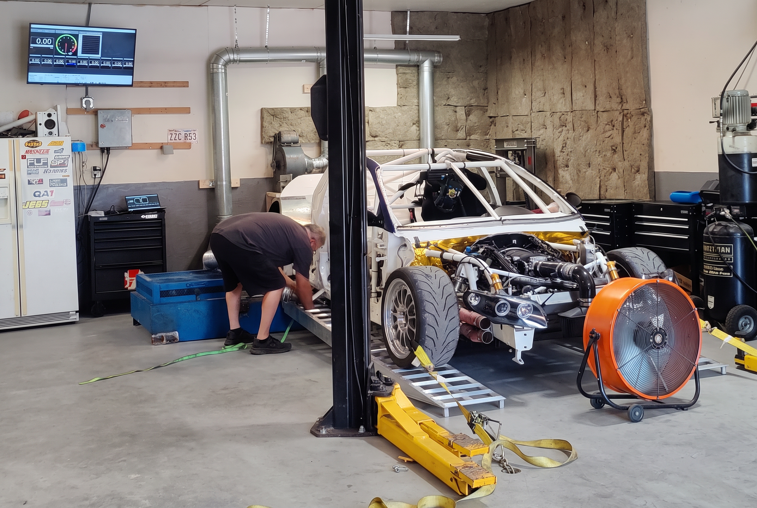 Car strapped down on the Mustang dyno during a tuning session